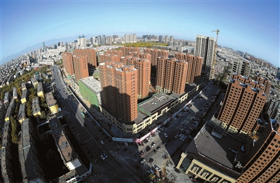 小區(qū)樓門口的人臉識(shí)別門禁系統(tǒng)